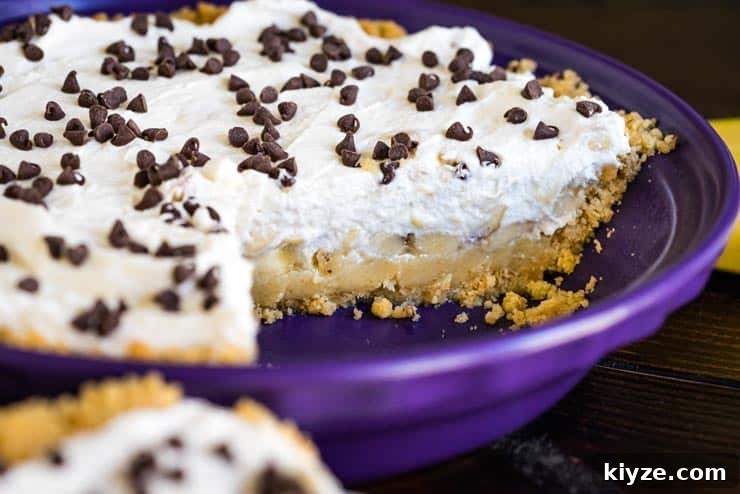 Banoffee Pie with shortbread crust in a purple pie dish