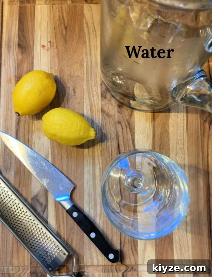 Benefits of Drinking Lemon Water Daily 4 ingredients on table