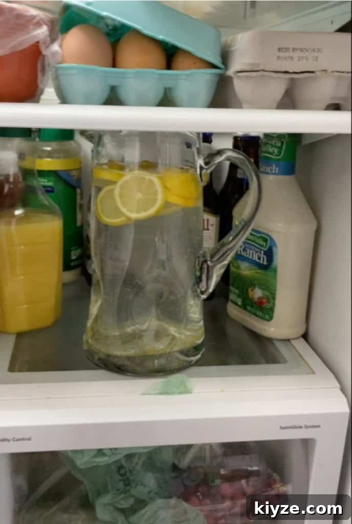 Benefits of Drinking Lemon Water Daily 9 pitcher in refrigerator