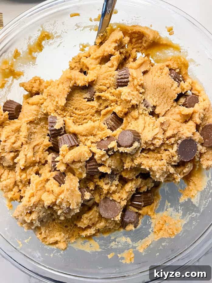 Peanut Butter Cup Blondies Recipe — Gooey Chocolate & Peanut Butter 4 blondie batter with reese's peanut butter cups