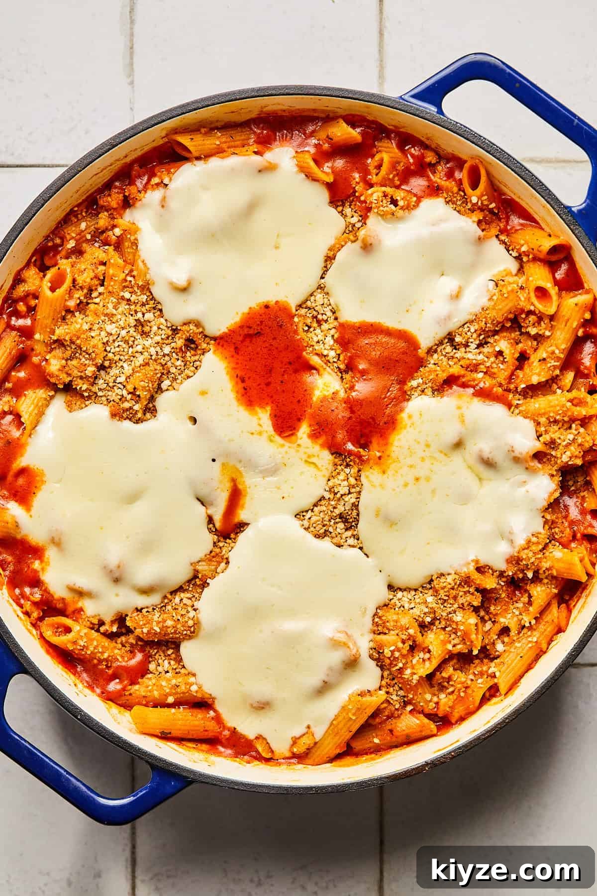 One-Pot Gluten-Free Chicken Parmesan Pasta Recipe 11 chicken parmesan pasta in a dutch oven topped with mozzarella