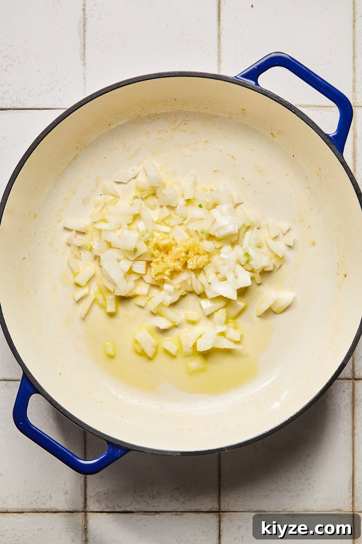 One-Pot Gluten-Free Chicken Parmesan Pasta Recipe 5 onions and garlic in a pan