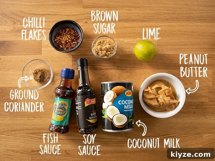 Homemade Satay Sauce Recipe for Grilled Chicken and Shrimp 3 Ingredient for satay sauce on a wooden table
