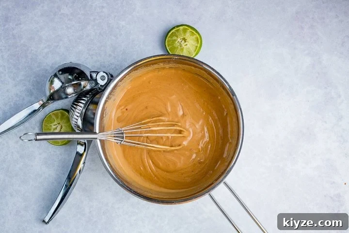 Homemade Satay Sauce Recipe for Grilled Chicken and Shrimp 5 Thai satay sauce in a pan on a light background