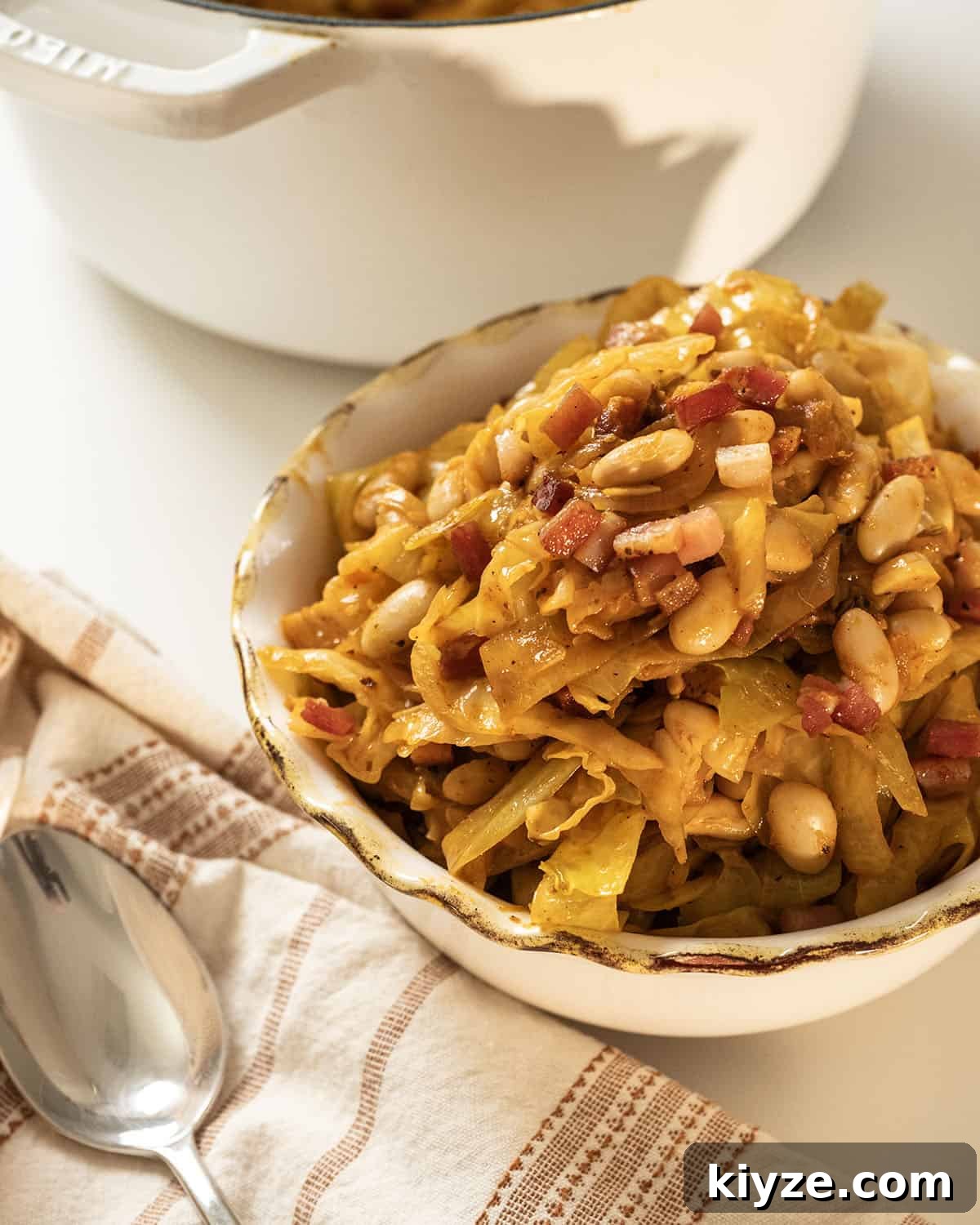 Savory Italian Cabbage with Garlic and Parmesan 12 Italian braised cabbage in a bowl.