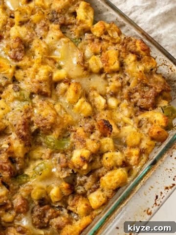 Italian sausage stuffing baked in a glass baking pan.