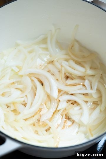 Savory Italian Cabbage with Garlic and Parmesan 6 onions sauteing
