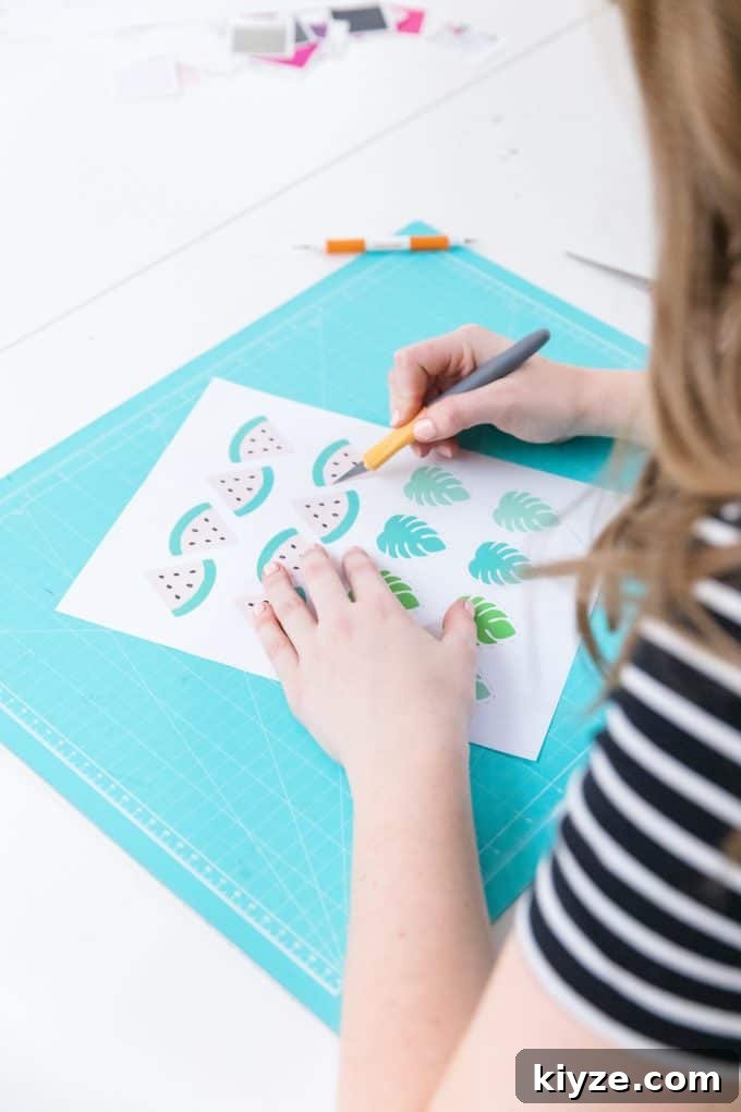 Craft Room Makeover Ideas: Transform Your Creative Space Quickly 4 Cutting watermelon printable cupcake toppers with an exacto knife.