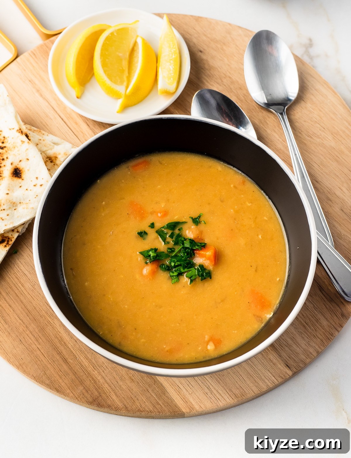 Traditional Lebanese Red Lentil Soup Recipe 8 Close-up of a bowl of Lebanese lentil Soup.