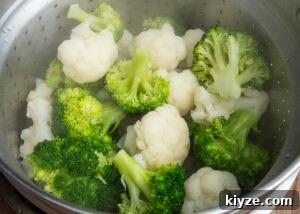 Cheesy Cauliflower and Broccoli Casserole Recipe 8 Cauliflower and Broccoli florets in a sieve