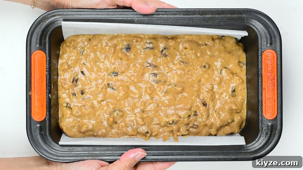 Tea-Infused Fruit Loaf Recipe for Afternoon Tea 8 fruit loaf batter in a lined loaf tin