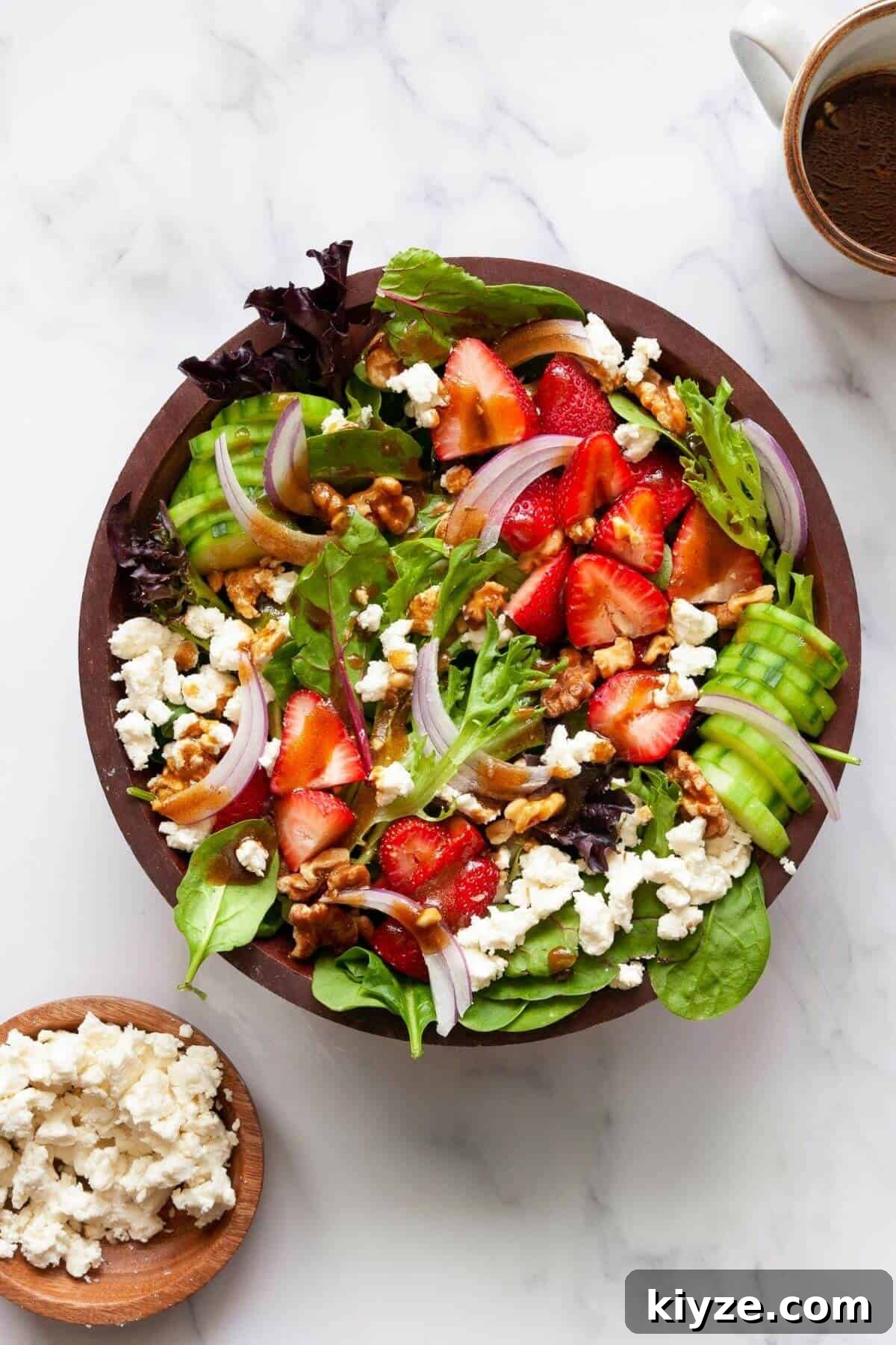 Easy strawberry goat cheese salad dressing in homemade balsamic vinaigrette.