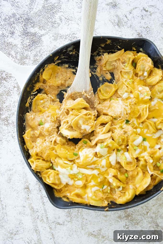 Creamy Buffalo Chicken Tortellini Skillet: One-Pot Recipe 4 buffalo chicken tortellini in a spoon