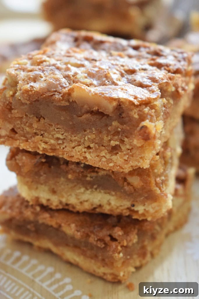 Chewy Maple Walnut Bars with Brown Butter Glaze 19 stacked maple walnut bars