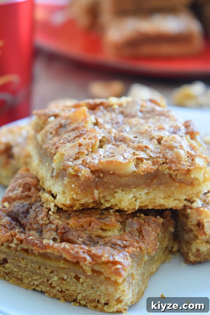 Chewy Maple Walnut Bars with Brown Butter Glaze 21 close up of the maple walnut bars
