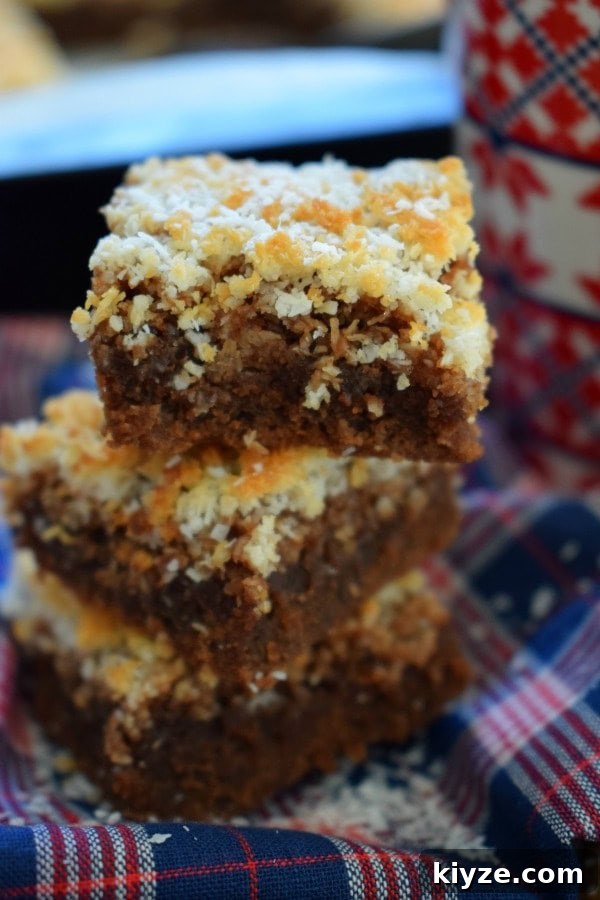 Chewy Maple Walnut Bars with Brown Butter Glaze 26 A stack of chocolate macaroon brownies