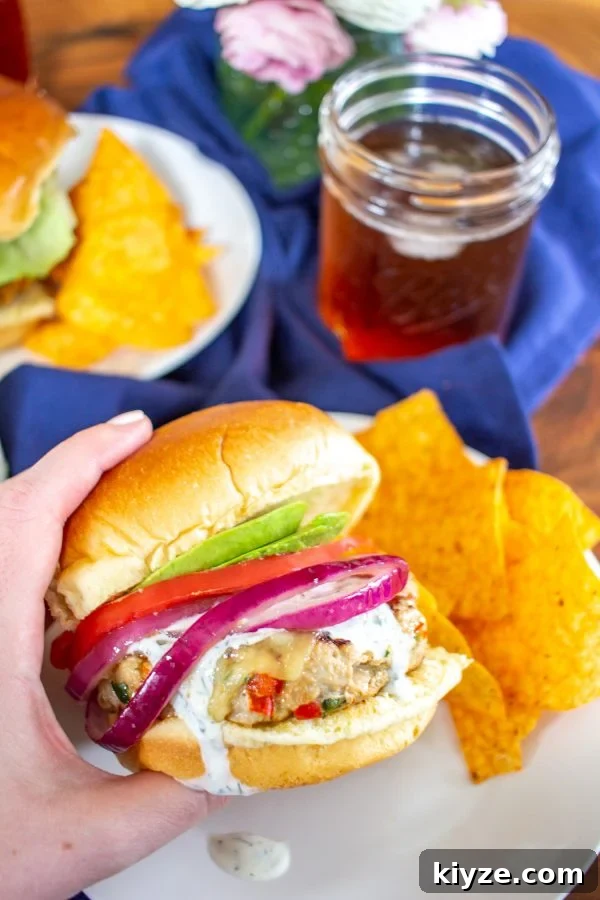 Southwest Turkey Burger Recipe with Spicy Avocado Slaw 2 These Southwest Turkey Burgers are loaded with chopped bell pepper, poblano pepper, onion, garlic, and spices so that they are bursting with flavor. These Southwest Turkey Burgers are an easy to make healthy alternative to a beef burger.