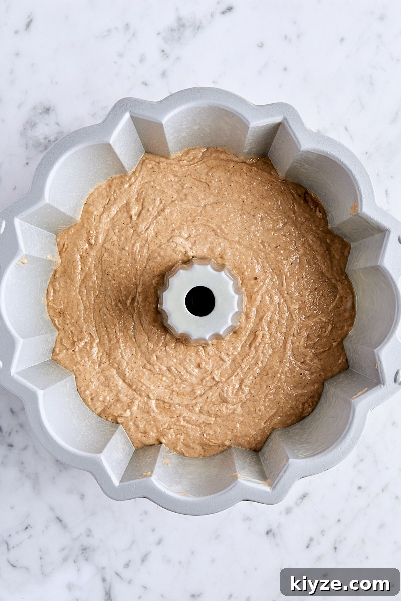 Spiced Bundt Cake with Gooey Butterscotch Topping 12 Spice cake batter in bundt pan