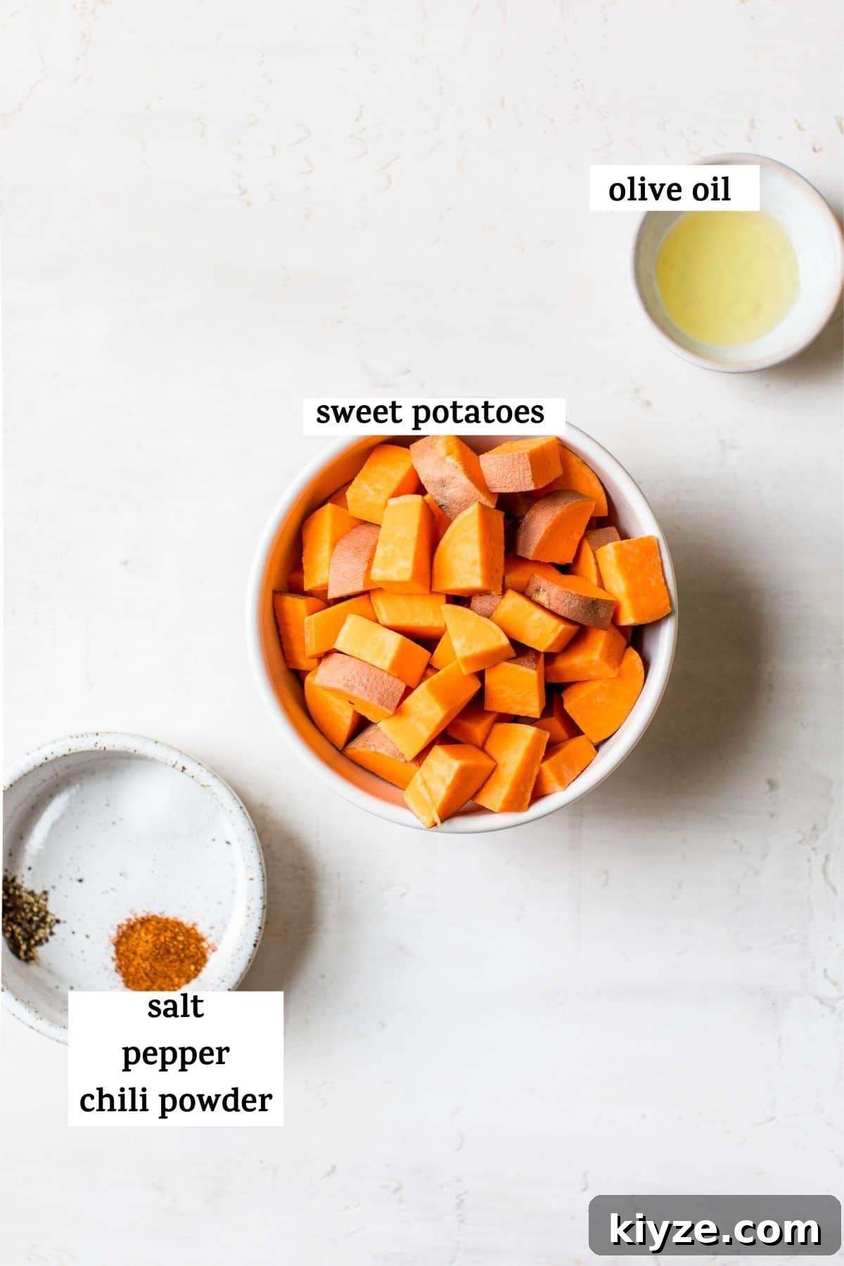 Crispy Air Fryer Sweet Potatoes: Quick Roasted Sweet Potato Recipe 3 diced sweet potatoes in a bowl