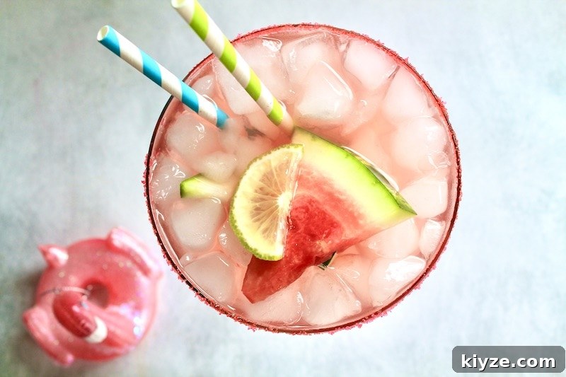 Pink Watermelon Margarita Recipe – Summer Tequila Cocktail 5 combine tequila juice agavie nectar and lime juice in a glass and stir,