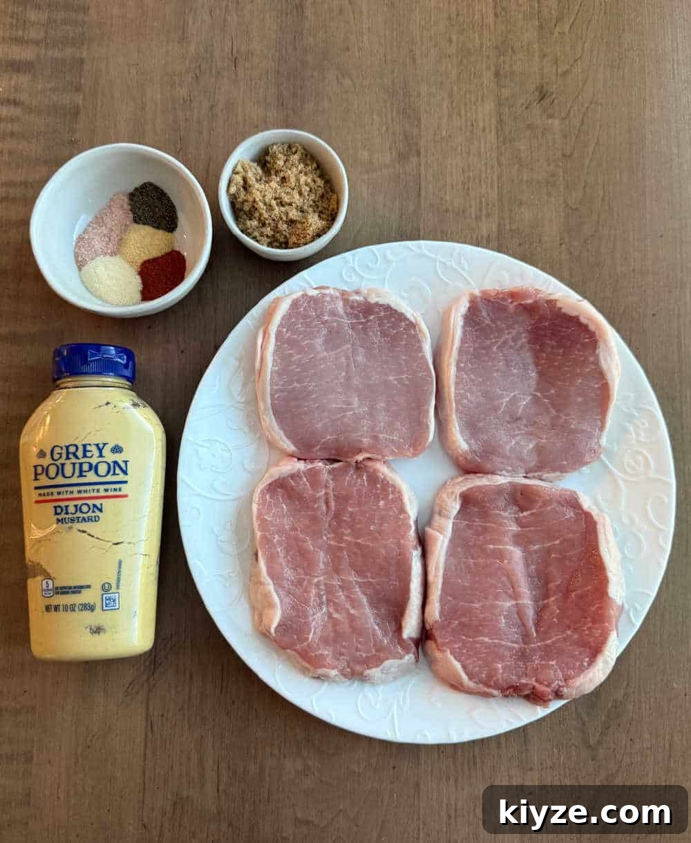 Brown Sugar Baked Pork Chops with Caramelized Glaze 3 boneless pork chops, mustard, spices, brown sugar.