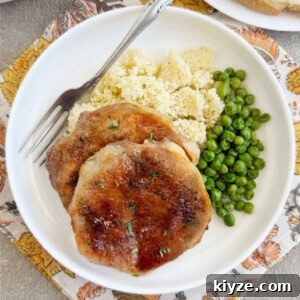 Brown Sugar Baked Pork Chops with Caramelized Glaze 9 baked brown sugar pork chops on plate.