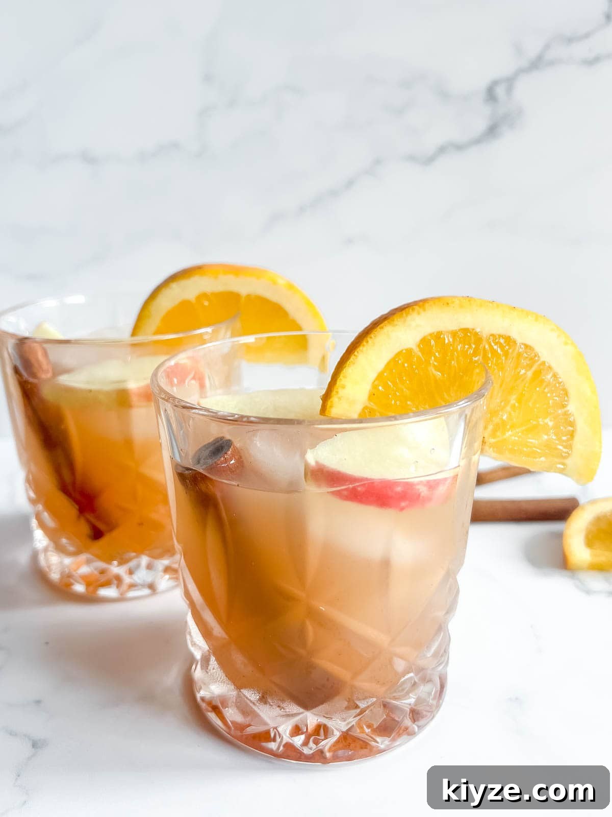 Apple Cider Whiskey Cocktail in two cups.