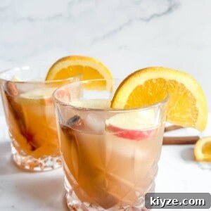 Apple Cider Whiskey Cocktail in two cups.