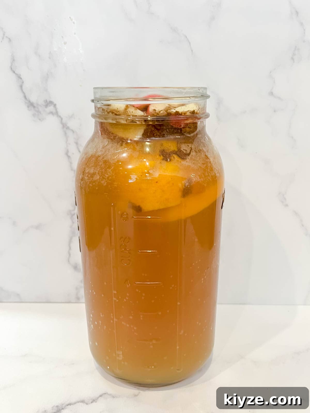 Thanksgiving Punch with alcohol after all the ingredients were added to the pitcher.