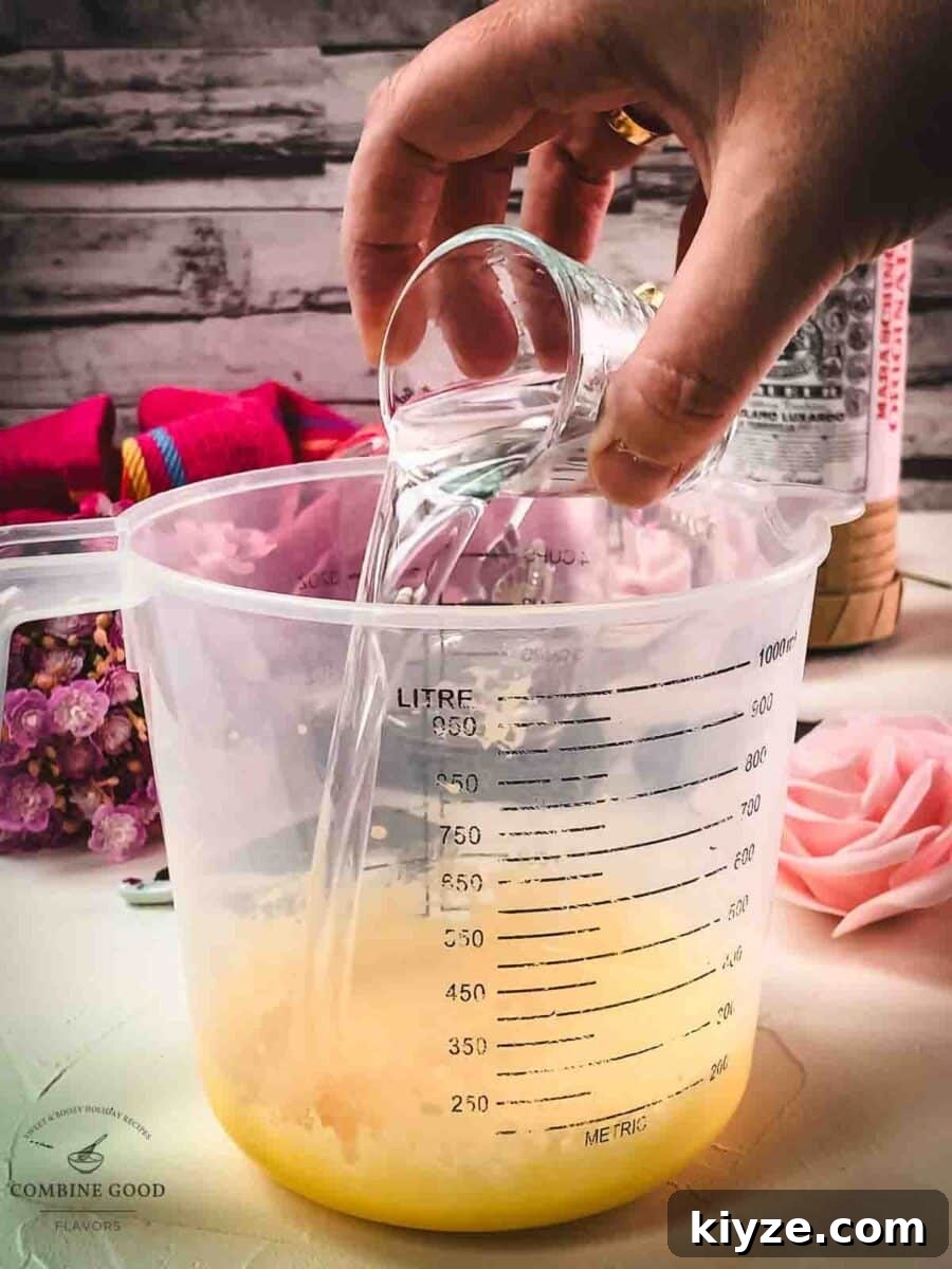 Classic Maraschino Milk Cocktail Recipe for Vintage Flavor 6 Add the Maraschino liqueur to the egg yolk sugar mix.