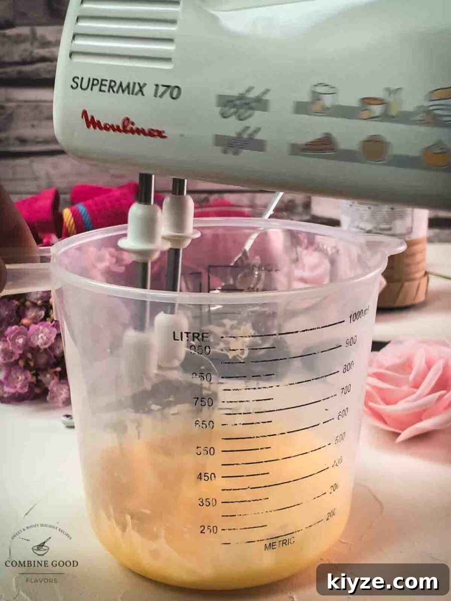 Classic Maraschino Milk Cocktail Recipe for Vintage Flavor 7 Whip up the Pour the egg yolk sugar Maraschino mixture.
