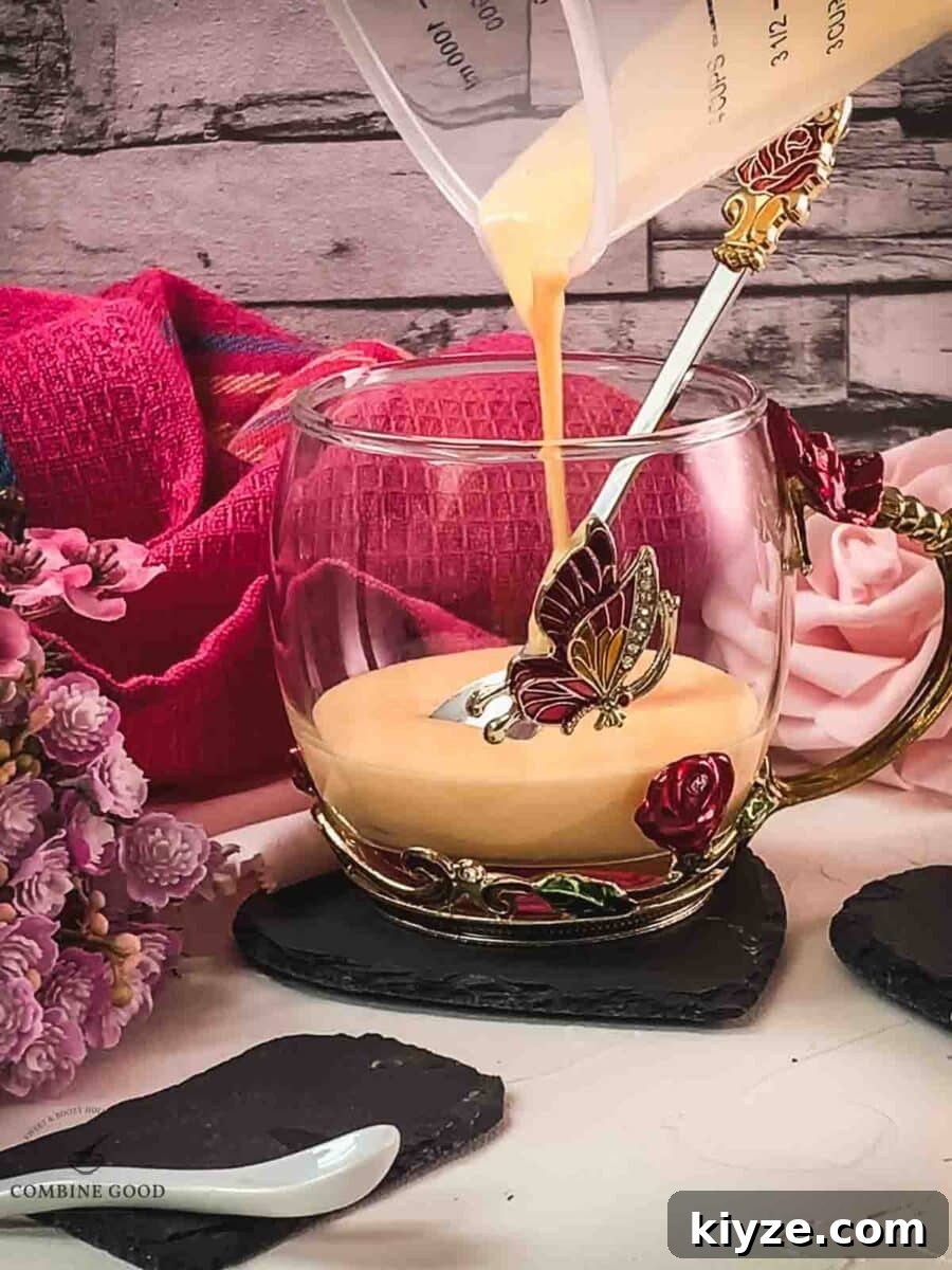 Classic Maraschino Milk Cocktail Recipe for Vintage Flavor 8 Pour the whipped up egg yolk sugar Maraschino mixture into the serving glass.