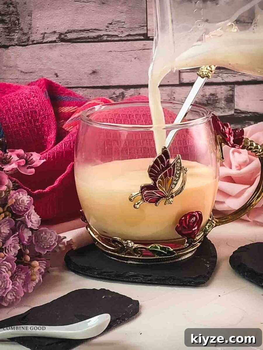 Classic Maraschino Milk Cocktail Recipe for Vintage Flavor 9 Pour the hot milk over the whipped up egg yolk sugar Maraschino mixture.