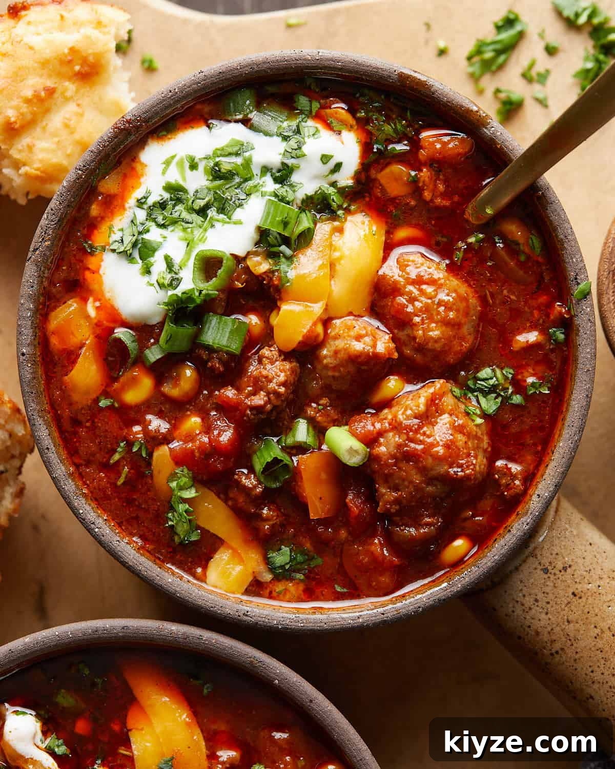 Slow Cooker Chili Recipe Without Beans — Rich & Hearty Flavor 5 Up close overhead image of slow cooker no bean chili with garnish.