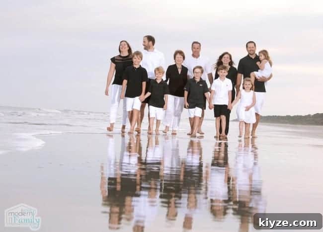 A group of people standing on a beach.
