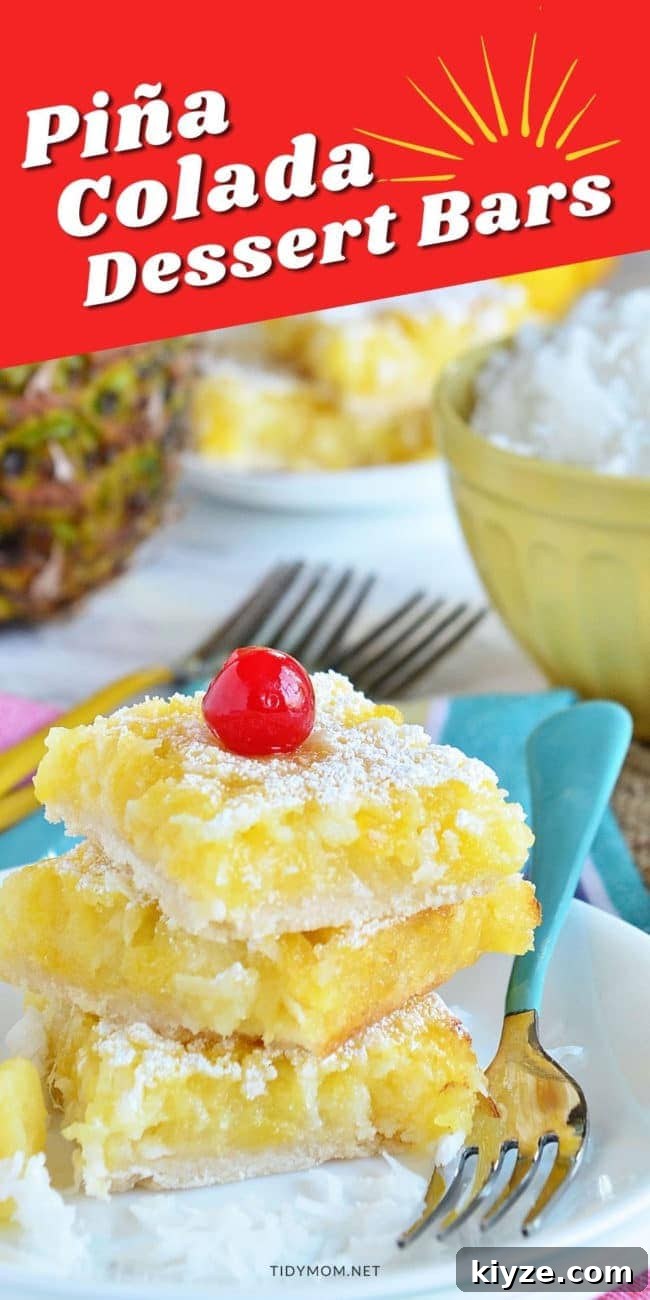 Pineapple Coconut Dessert Bars (Piña Colada) + Video 12 3 dessert bars with a cherry on top stacked on a plate