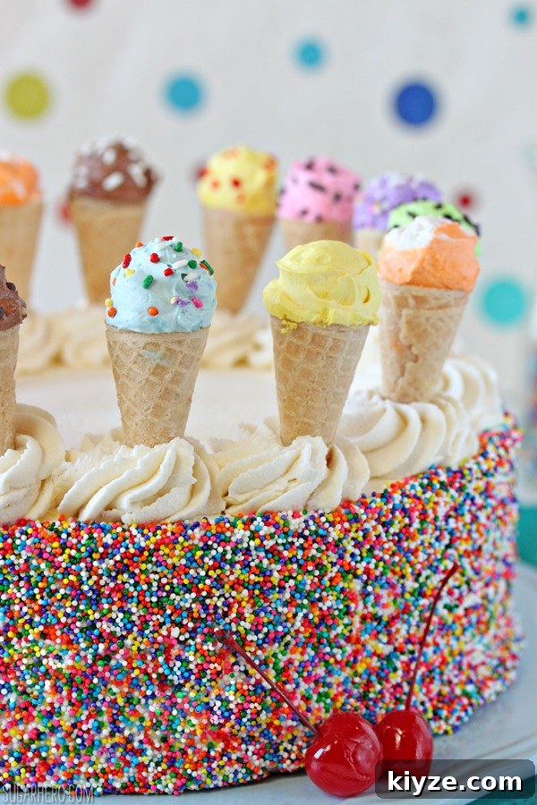 Miniature ice cream cones on cake