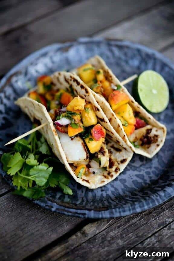 15 Irresistible Peach Recipes for Every Season 8 Chipotle Fish Tacos with Peach Salsa | feastingathome.com