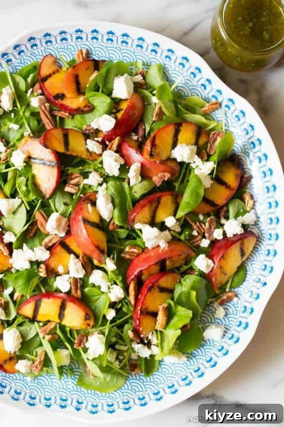 15 Irresistible Peach Recipes for Every Season 10 Grilled Peaches and Watercress Salad | aspicyperspective.com