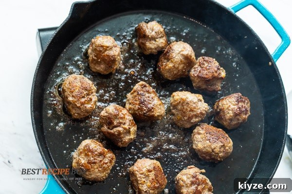 Salisbury Steak Meatballs in Rich Brown Gravy 6 browning meatballs in skillet