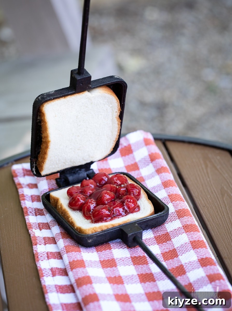 making a cherry mountain pie in mountain pie maker.