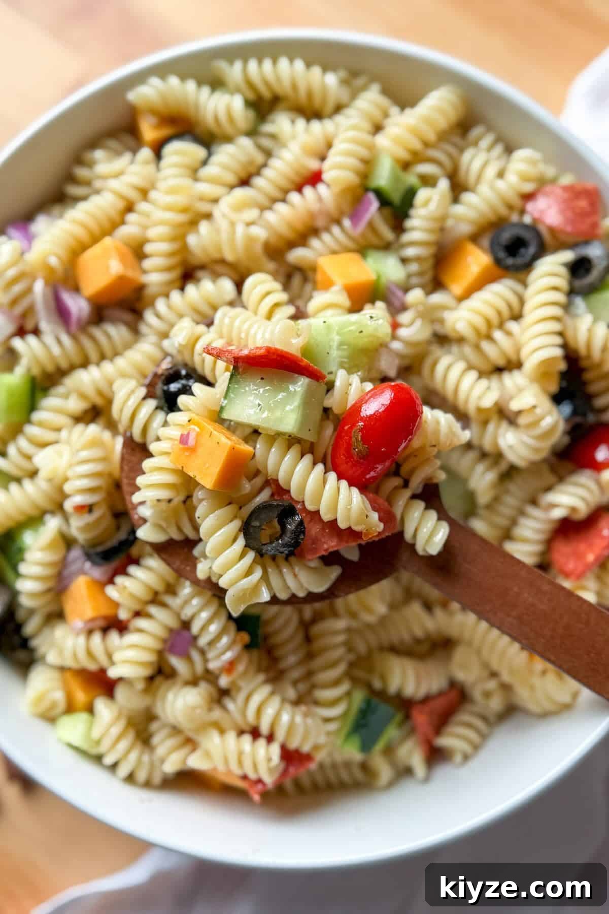 Graduation Party Menu Ideas: 6 Crowd-Pleasing Meal Plans 8 Classic Italian pasta salad ready to serve as a cold side dish for potlucks and BBQs.