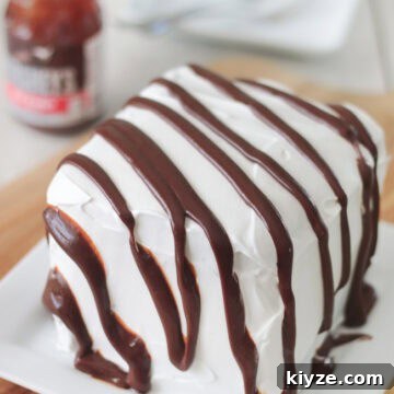 How to Make an Ice Cream Sandwich Cake (Video Tutorial) 9 ice cream sandwich cake on plate