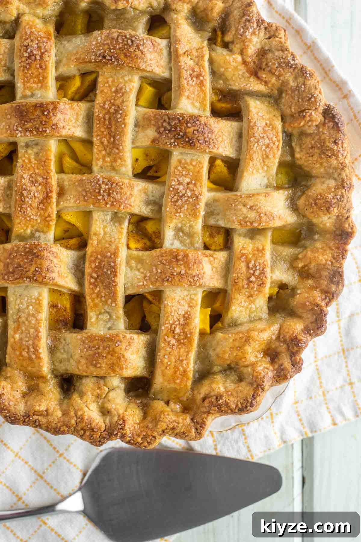 Peach and Mango Pie Recipe: Flaky Crust with Luscious Filling 2 overhead shot of peach mango pie with lattice top crust