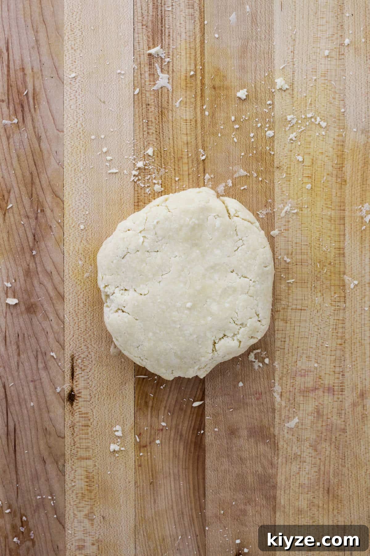 Butter Pie Crust Made in a Food Processor: Quick Recipe 7 Pie dough on a work surface in a surface.