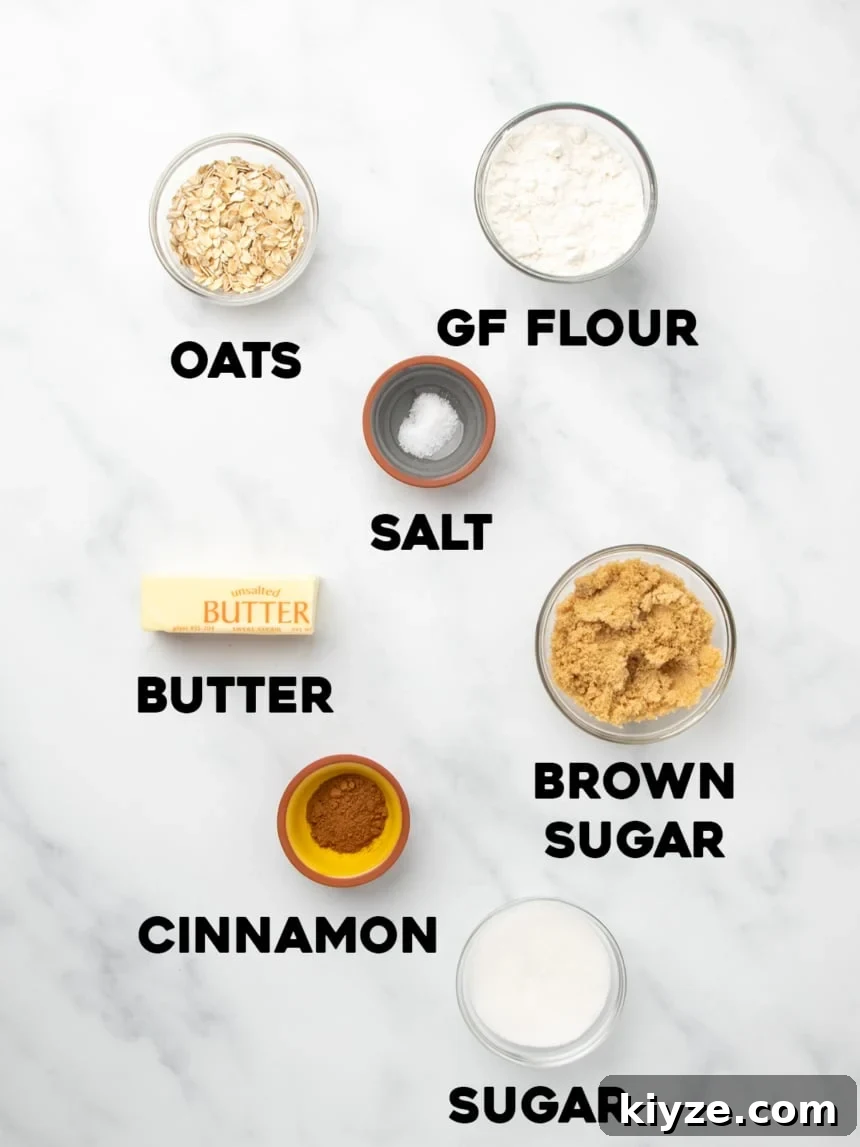 Gluten-Free Sweet Potato Casserole Recipe for Holidays 5 Ingredients labeled with bold text on a white marble surface, including oats, gluten free flour, salt, butter, brown sugar, cinnamon, and white sugar.