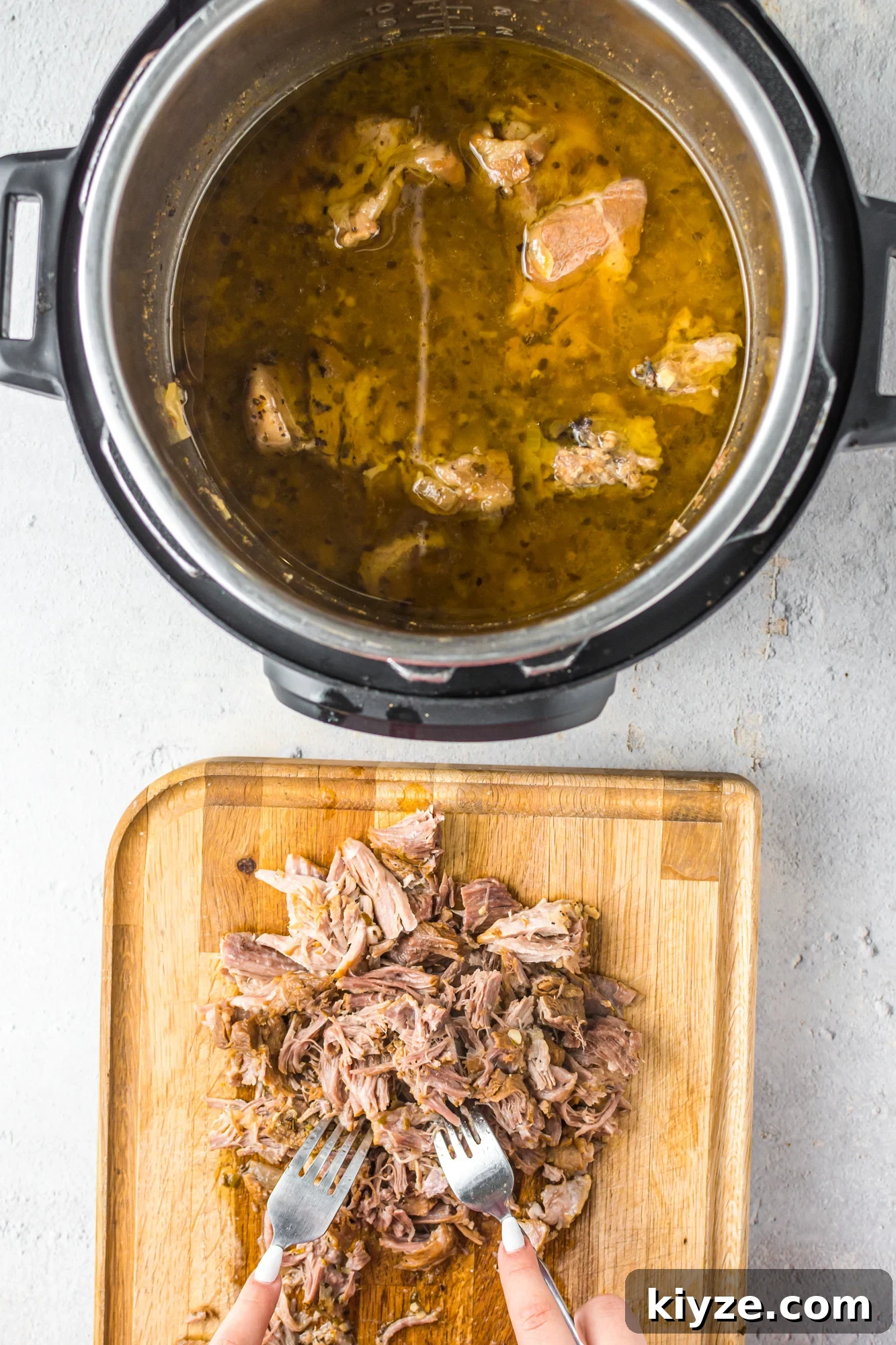Juicy Instant Pot Pork Roast with Garlic and Herbs 7 Instant Pot Pork Roast on cutting board