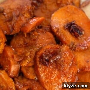 bourbon candied yams with pecans on top.