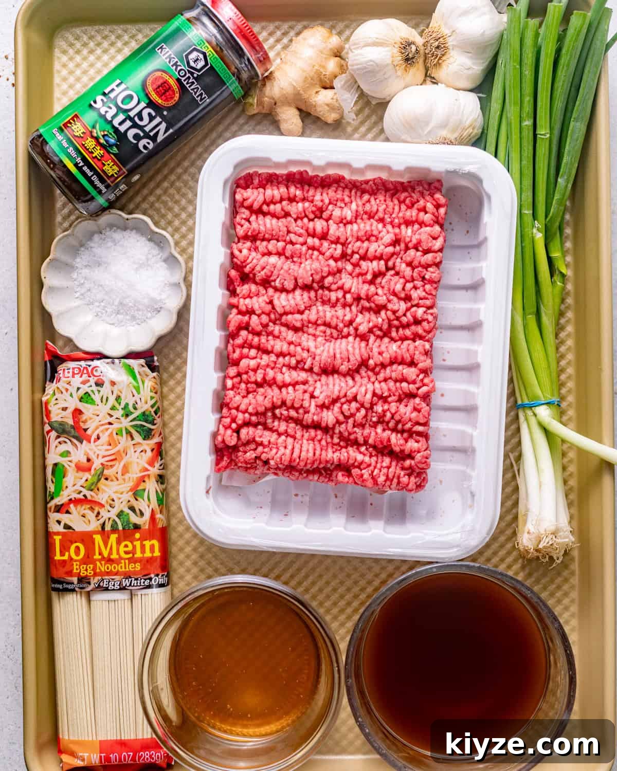 Mongolian Beef Noodles with Ground Beef and Scallions 3 ingredients to make mongolian ground beef noodles - ground beef, hoisin sauce, lo mein noodles, scallions, beef broth, honey, soy sauce, garlic, salt, and fresh ginger.