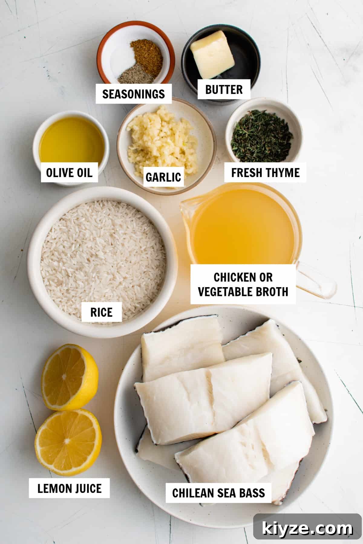 all of the ingredients for chilean seas bass on a white countertop